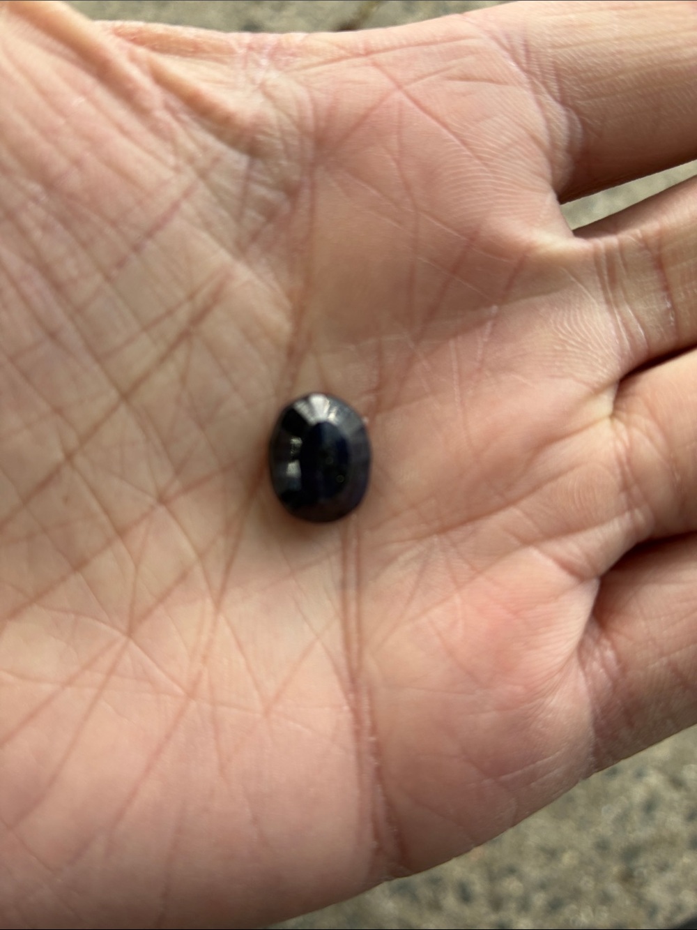 Small Dark Blue Oval Gemstone
